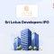Sri Lotus Developers IPO announcement banner, featuring the company logo, company name, and a design vector.